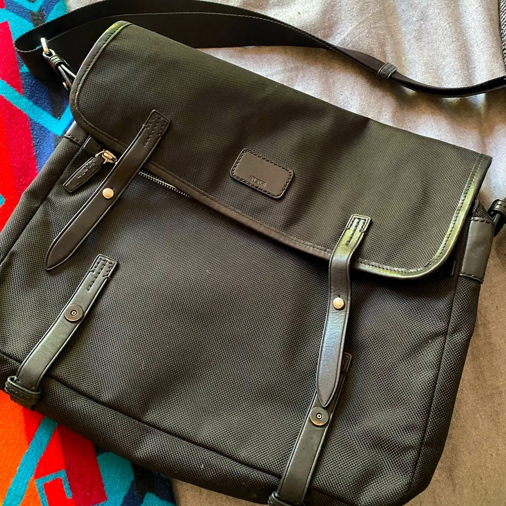 Beautiful unused Tumi over the shoulder bag.